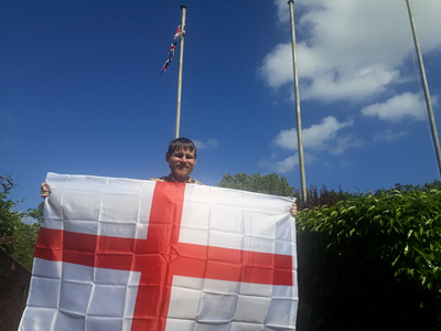 Stephen O'Brien with an England flag outside Sunderland Civic Centre