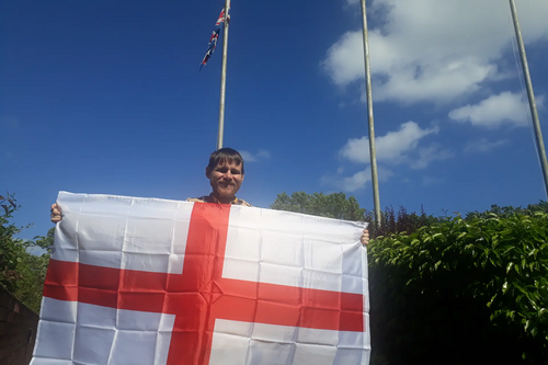 Stephen O'Brien with an England flag outside Sunderland Civic Centre