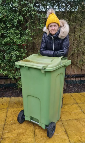 Julia Potts with wheelie bin