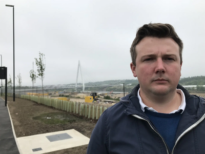 Lib Dem councillor for Pallion Martin Haswell in front of the Northern Spire bridge