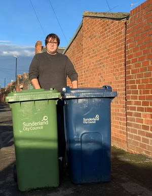 Paul Edgeworth with wheelie bins