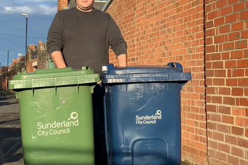 Paul Edgeworth with wheelie bins