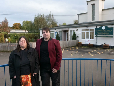 Councillor Margaret Crosby and Lib Dem campaigner Paul Edgeworth outside Thorney Close Primary School